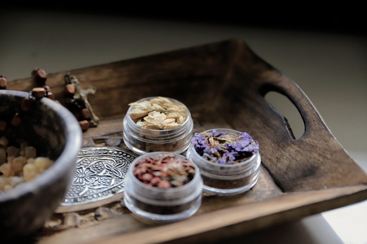 Crafting Captivating Headlines: Your awesome post title goes here Close-up of dried flowers in jars on a vintage tray, ideal for aromatherapy or home decor.